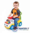 Jeździk Fisher Price Muzyczna Parada żółty